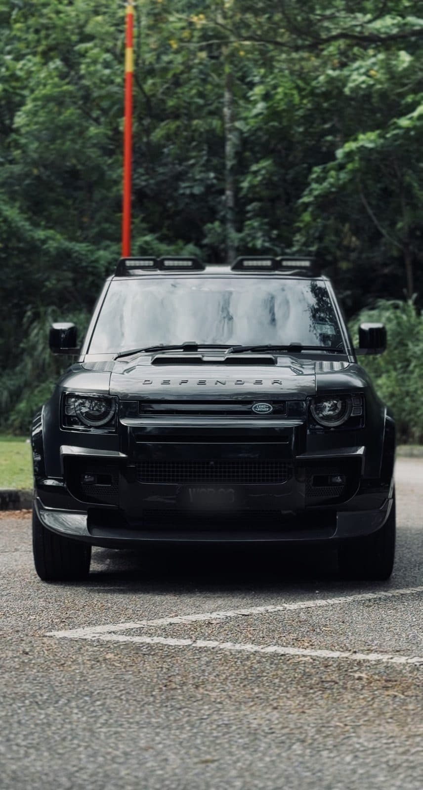 2023 Land Rover Defender available for luxury car rental in Kuala Lumpur — SUV class on the published rate sheet