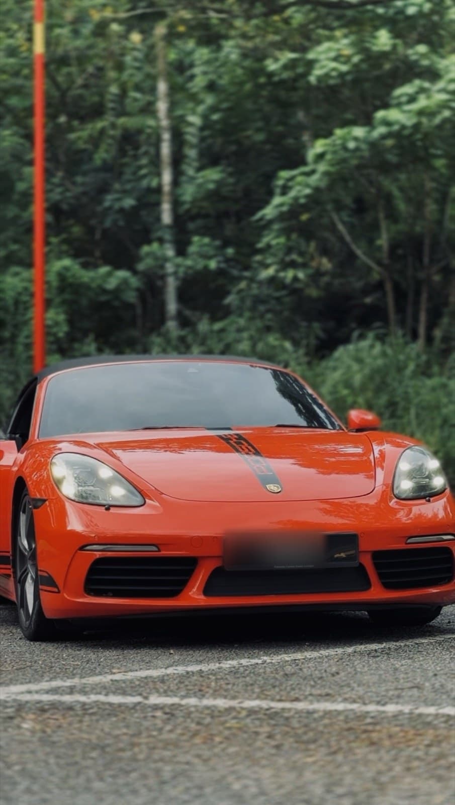 2022 Porsche 718 Boxster available for luxury car rental in Kuala Lumpur — Convertible class on the published rate sheet